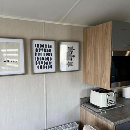 Sandy Bay Caravan Getaway 滨海纽比金 外观 照片