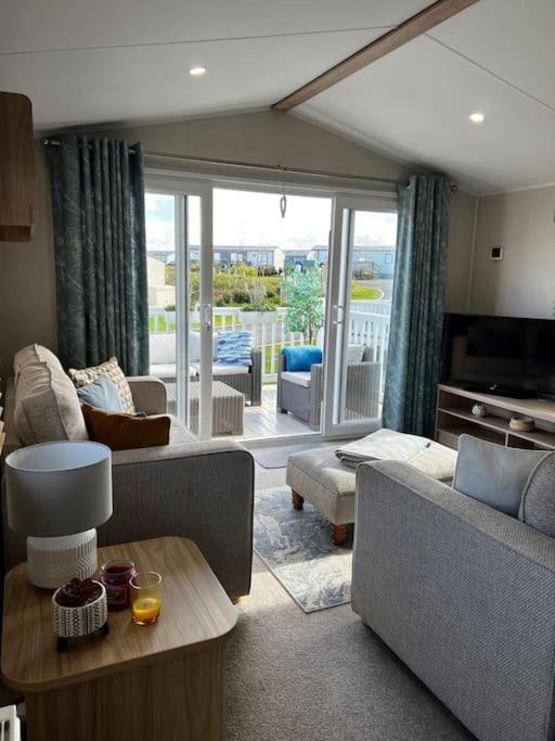 Sandy Bay Caravan Getaway 滨海纽比金 外观 照片