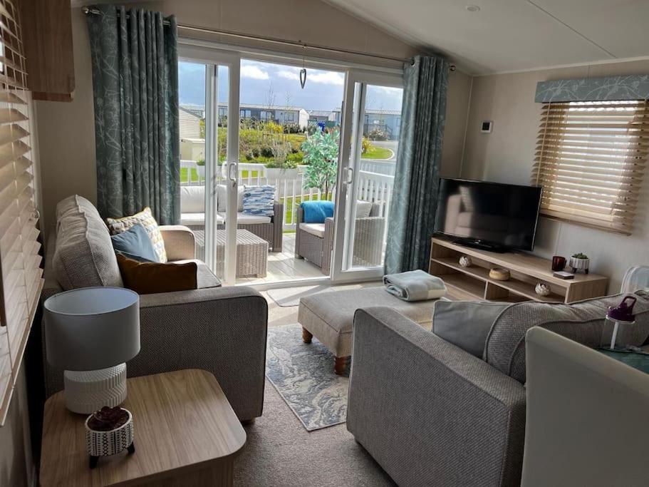Sandy Bay Caravan Getaway 滨海纽比金 外观 照片