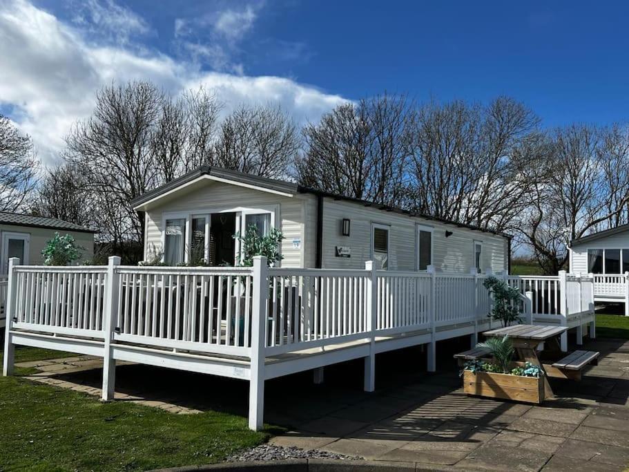 Sandy Bay Caravan Getaway 滨海纽比金 外观 照片